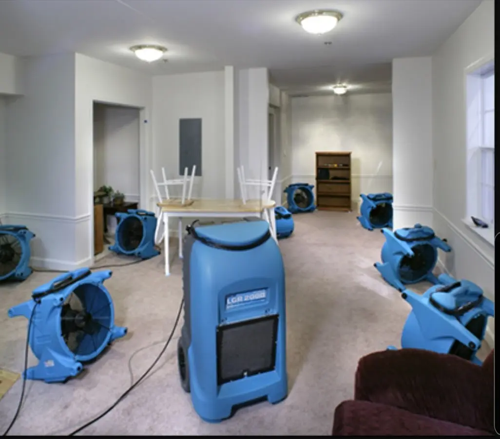 Air movers and dehumidifier setup for Water Damage Restoration in Socastee